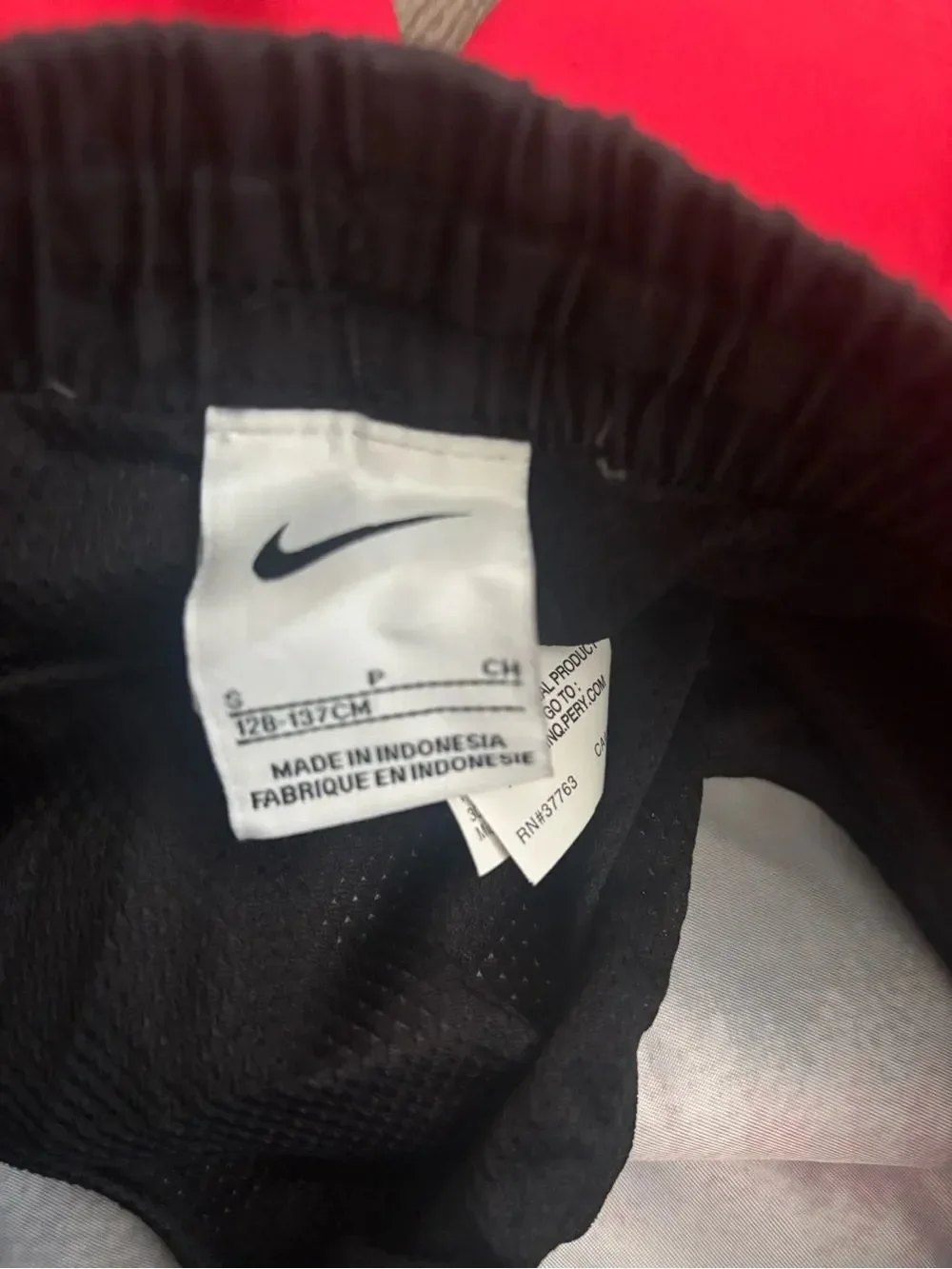 Nike Black and Red swim Shorts with Swoosh